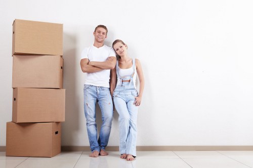 Merton movers handling boxes during a residential relocation