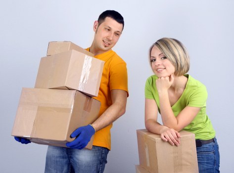 Packed business items ready for transport during a Merton move
