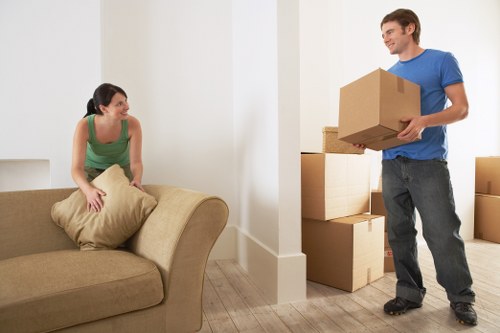 Packing and loading furniture into a removal van
