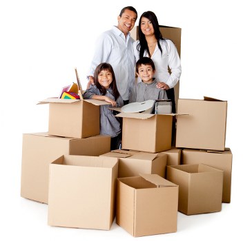 Movers working carefully with boxes and equipment in a tidy loading area